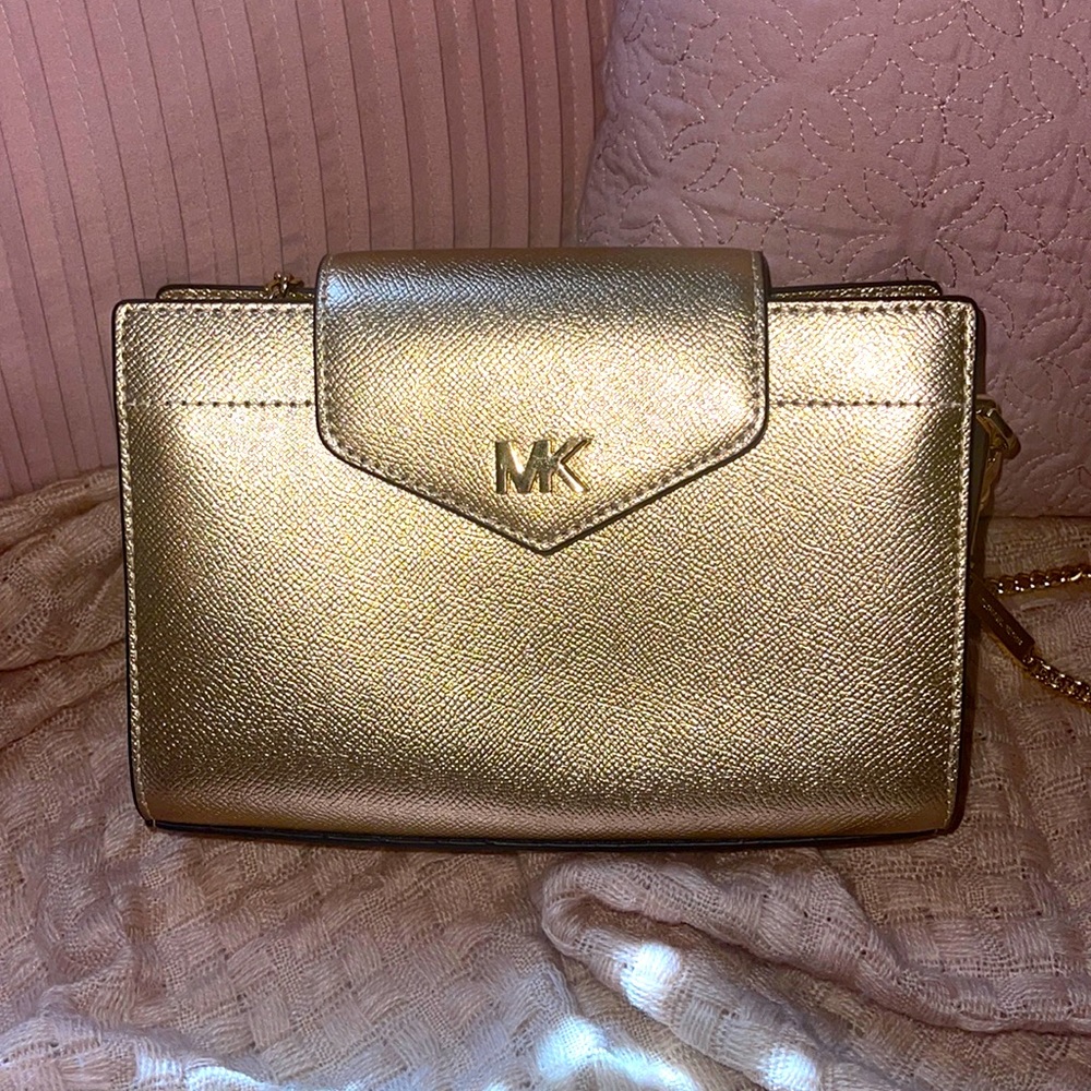 Gold crossbody Michael Kors purse